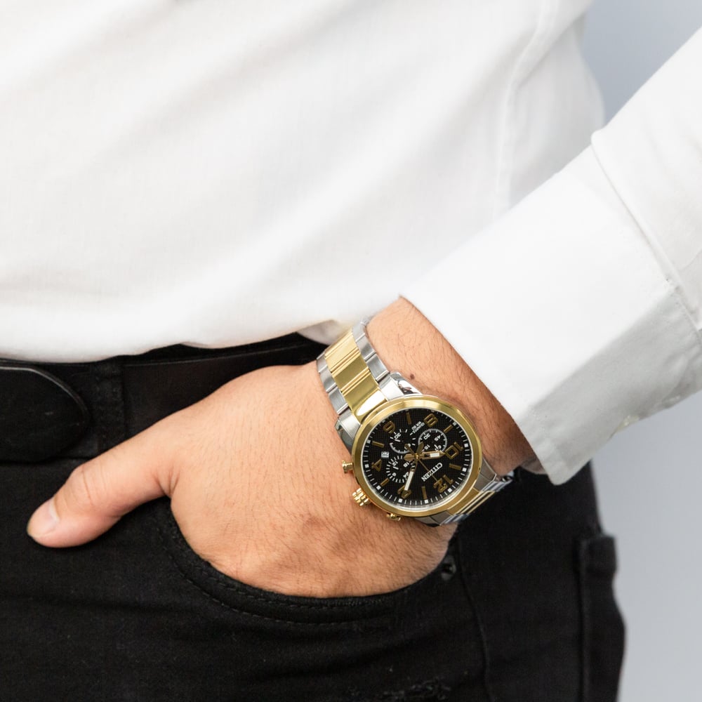 Citizen AN8054-50E two-tone black dial chronograph shown on wrist