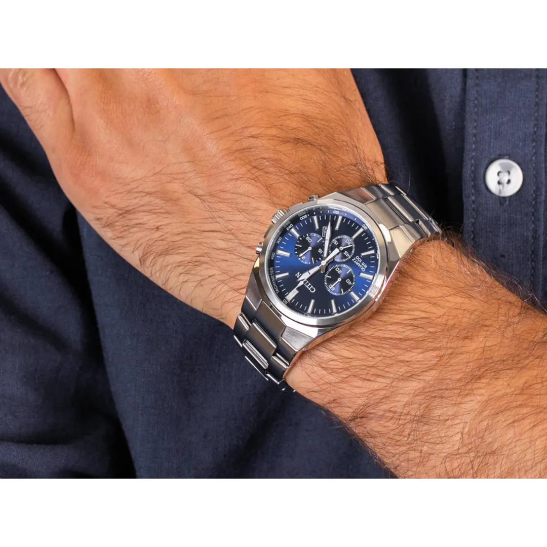 Citizen AN8170-59L blue dial quartz chronograph shown on wrist