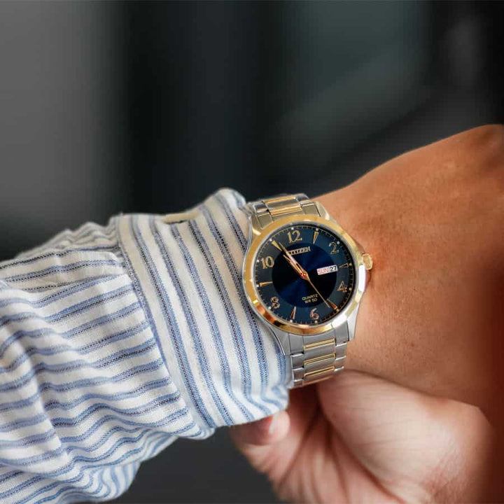 Citizen BF2005-54L two-tone blue dial watch worn on wrist