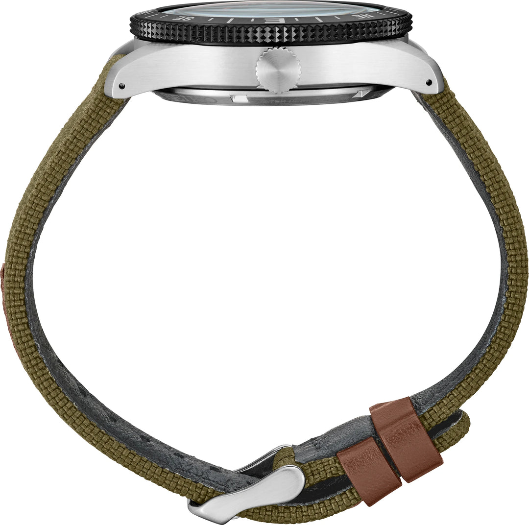 Seiko HDB008 side profile showing the steel case, crown, black compass bezel and nylon strap with leather details