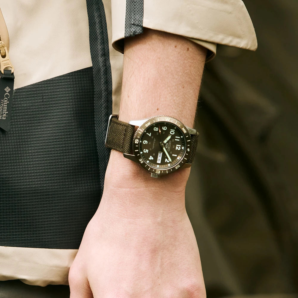 Seiko HDB009 on-wrist view showing brown dial and strap