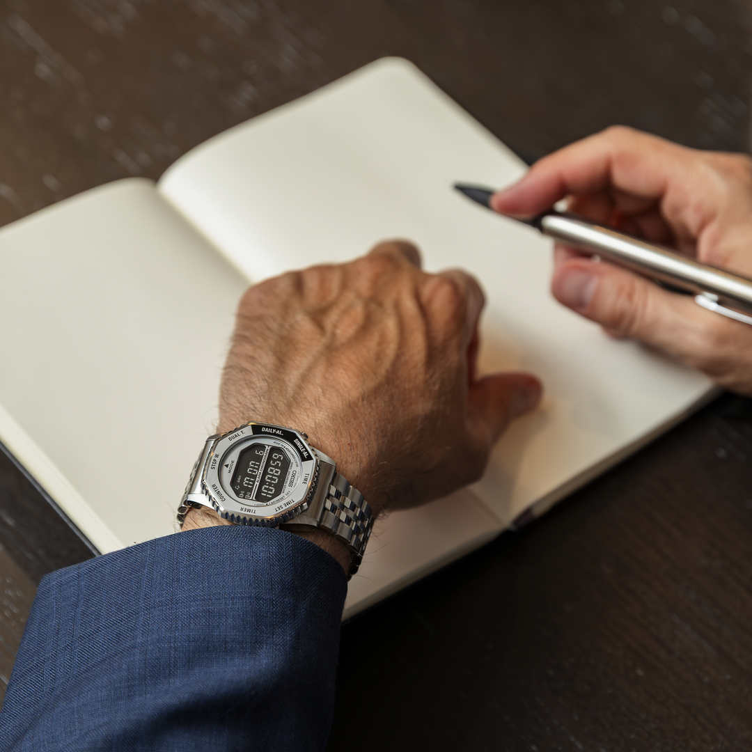 Seiko HFL002 Rotocall digital watch worn while writing