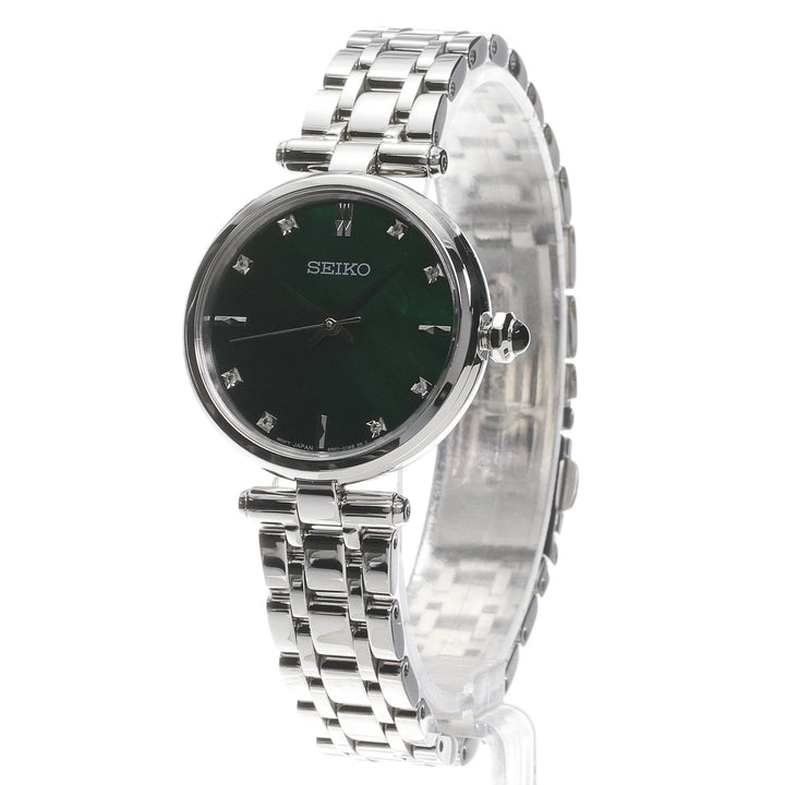 Seiko HGH006 green mother-of-pearl diamond dial and slim stainless steel case, angled view