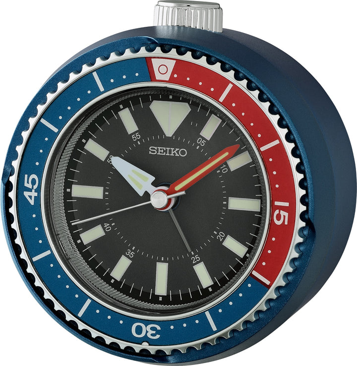 Seiko QHE207LLH blue and red rotating bezel alarm clock, front view