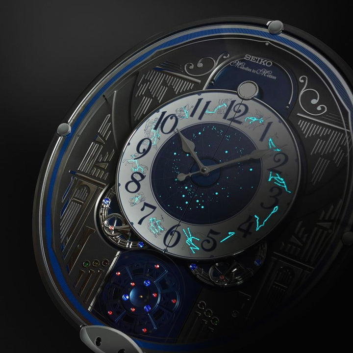 Seiko QXM393NRH musical wall clock decorative wheel and LED detail