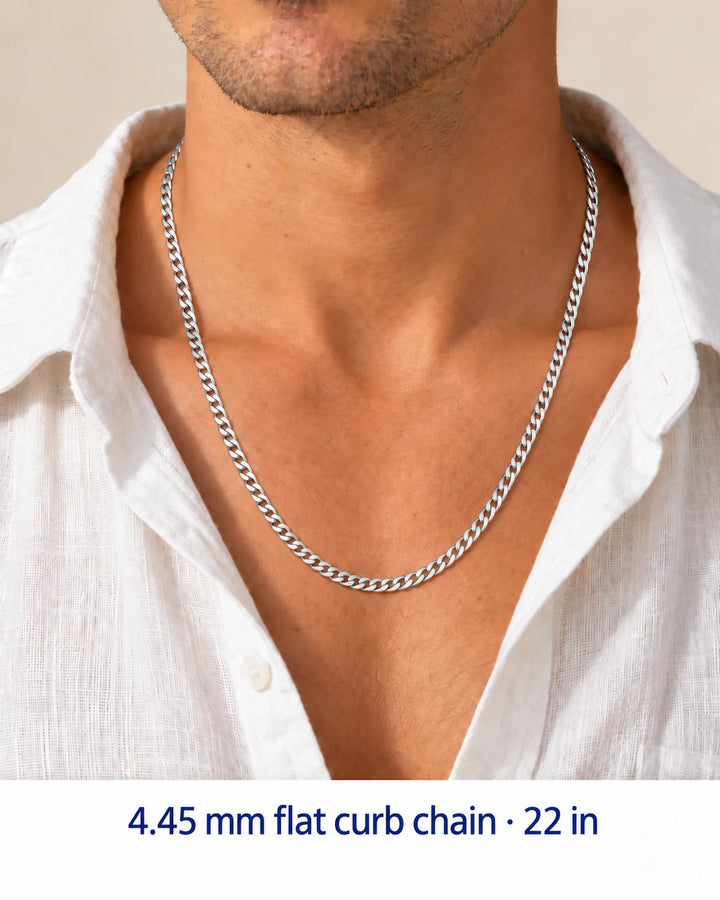 Men's styling view of a 4.45 mm sterling silver flat curb chain necklace, shown at a 22-inch example length.