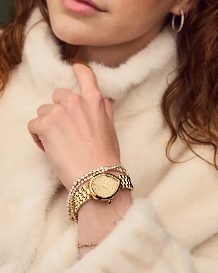 EM1202-50P watch with a 26 × 31mm case worn on a wrist