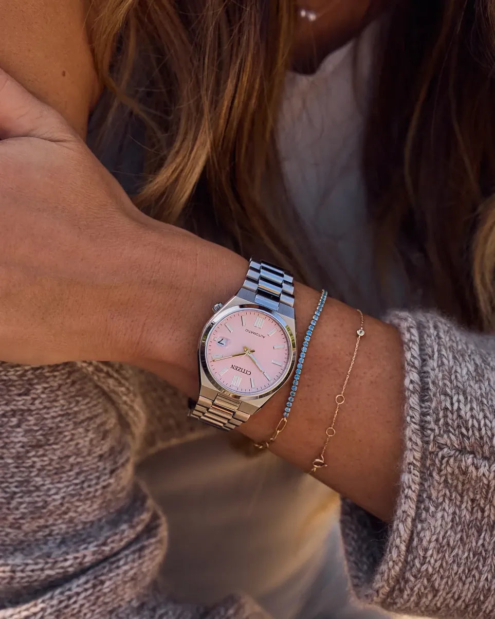 NJ0200-50Z watch with a 37mm case worn on a wrist